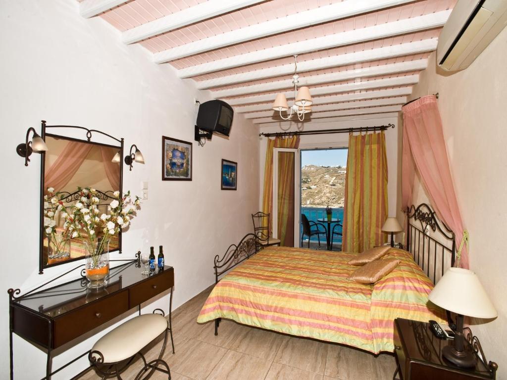 Vana Holidays Ornos  Room photo
